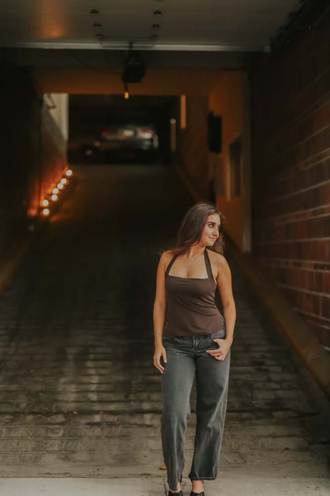 Standing in the lit underpass