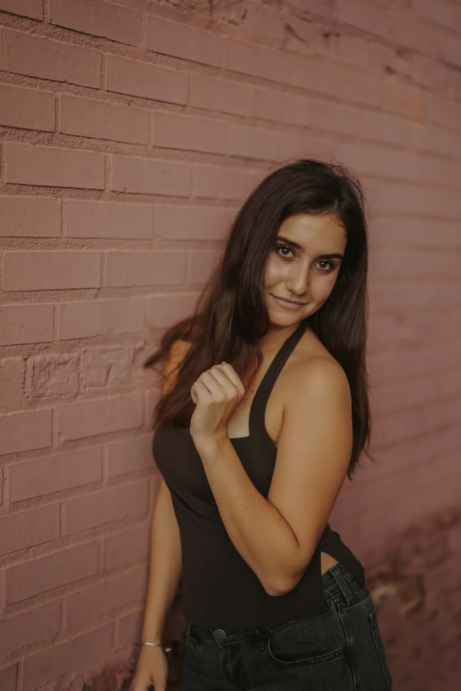 Close portrait in the warm alley light