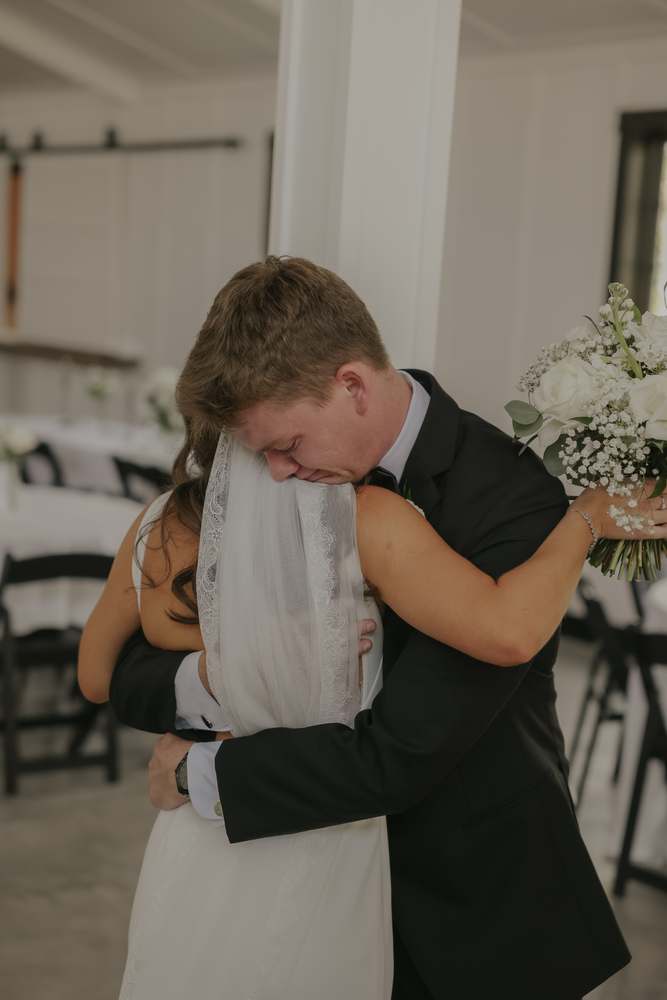 The couple's first look, foreheads together