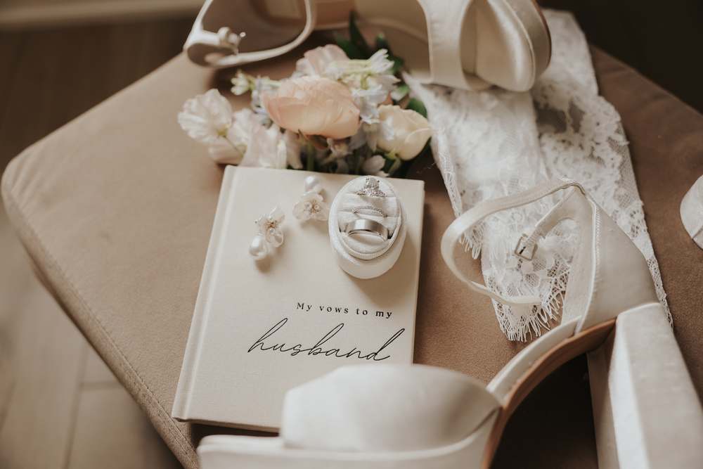 Vow book, rings and heirloom earrings