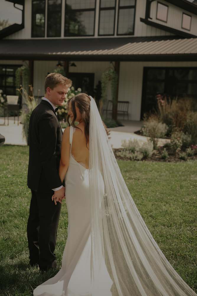 The train and veil laid out across the lawn