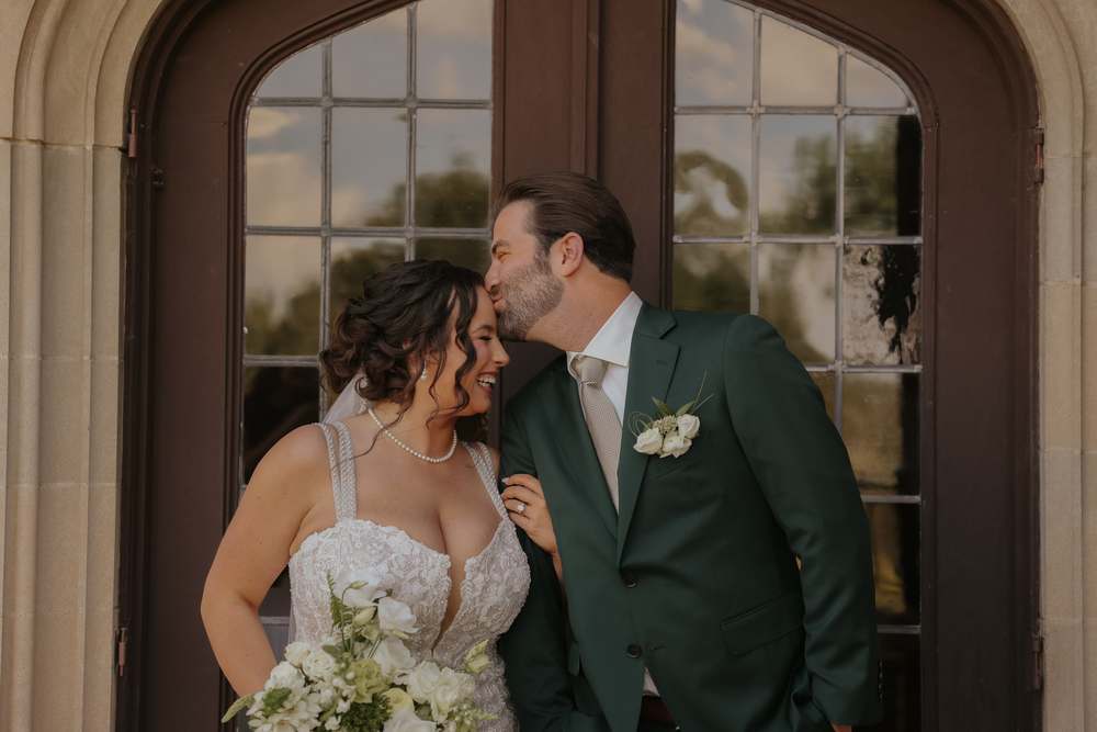 A kiss in the arched doorway