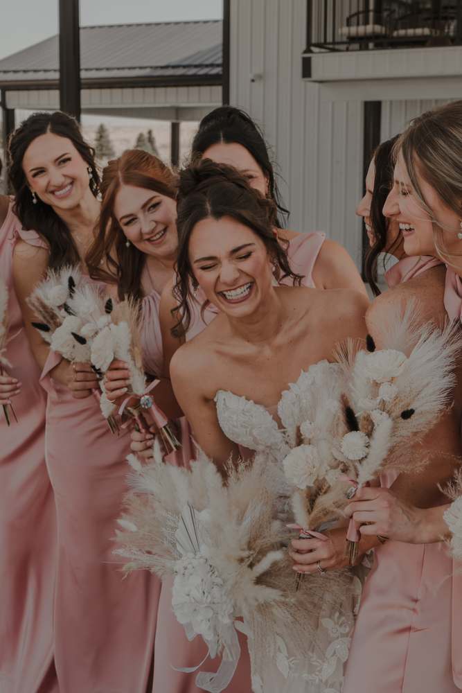 The bride surrounded by her bridesmaids