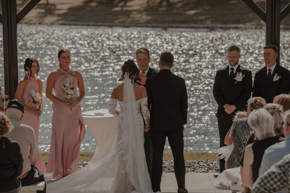 Vows beside the water