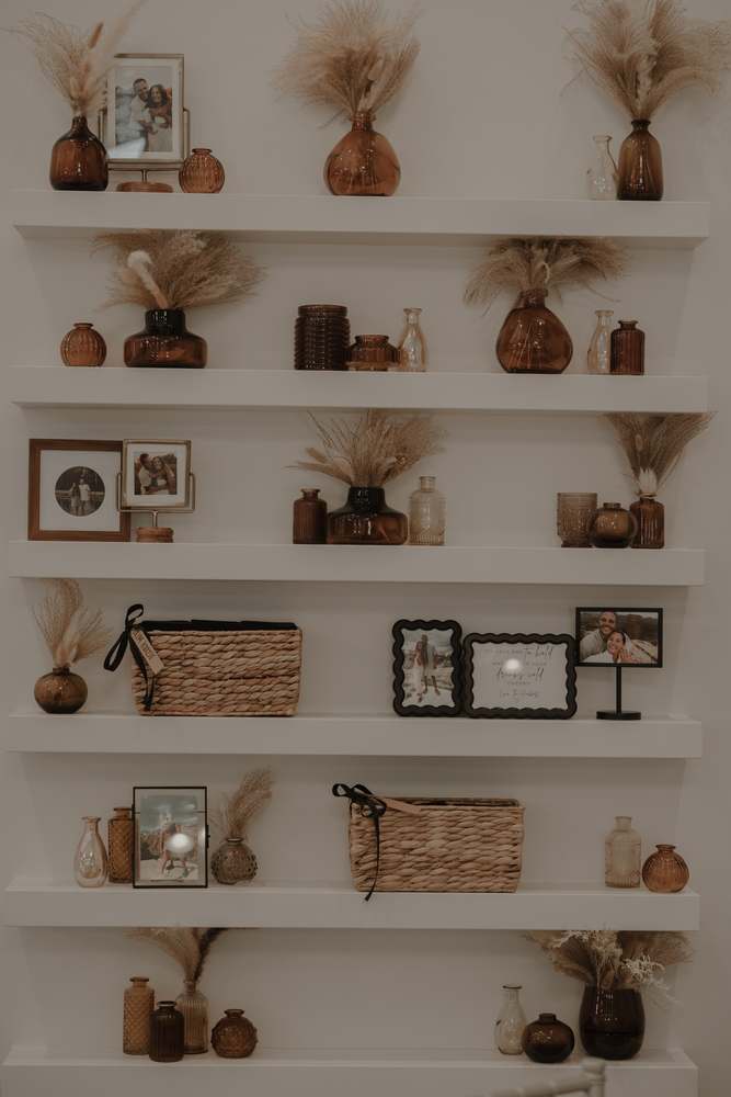 Dried florals styled on the venue shelving